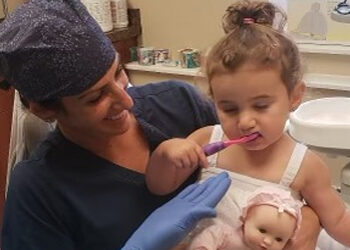 Dentist with a little kid